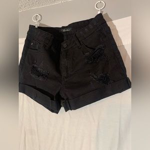 Black denim shorts with rips
